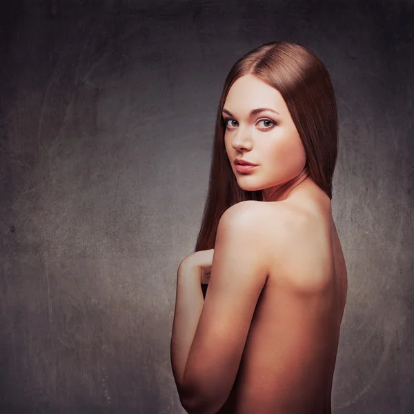 Beautiful woman with naked back portrait