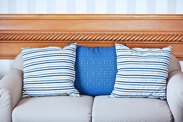 Sofa with pillows in an interior