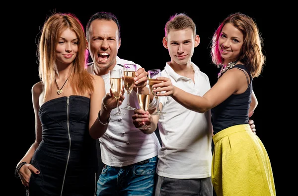 Group of young people with glasses of sparkling champagne