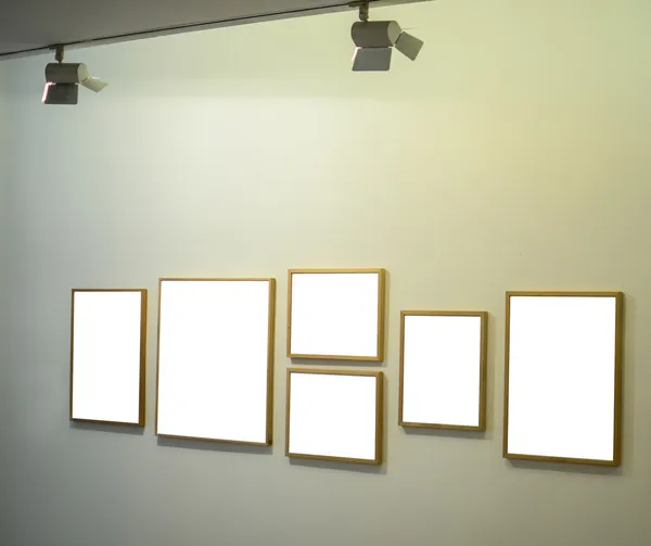 Empt frames on gallery wall