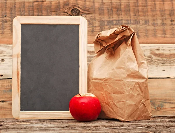 School lunch over blank blackboard