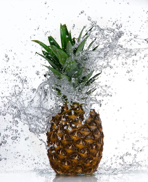 Pineapple with water splash