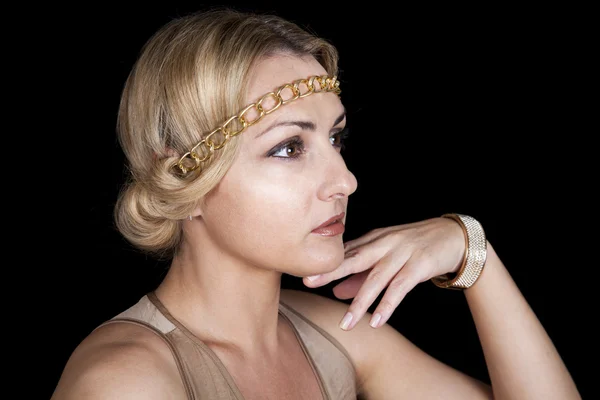 Girl in the Greek style, with chain-rim on the head and a gold bracelet on her arm.