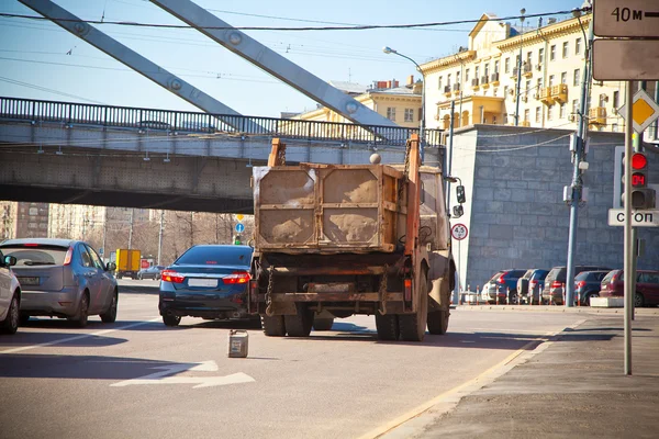 Old truck broke down on the road in the city