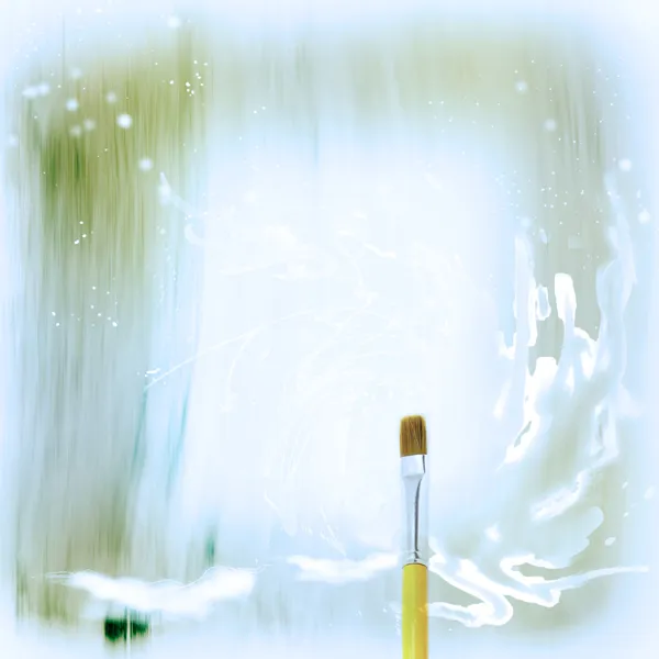 Wooden yellow Paint Brush and abstract drawing painted in watercolor in fantasy style