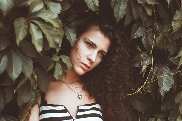 Beautiful portrait of a fashion lady outdoor, close-up shoot