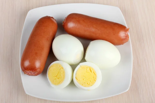 Egg and red sausage