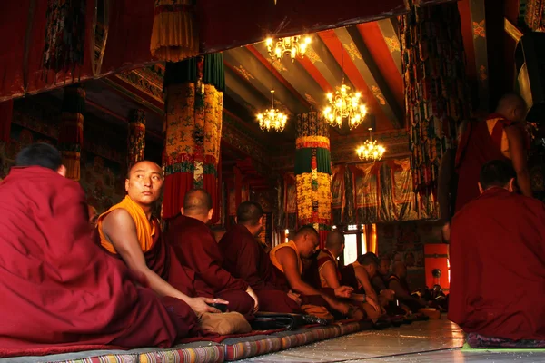 Monks on the floor