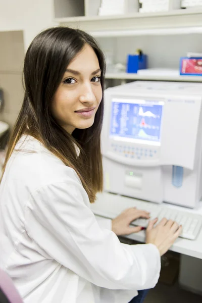 Young woman in medical laboratory