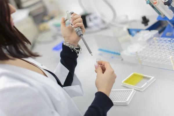 Young woman in the medical laboratory