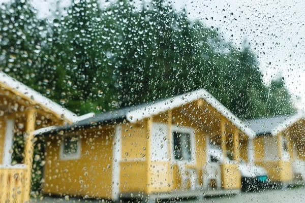 Camping cabins in heavy rain