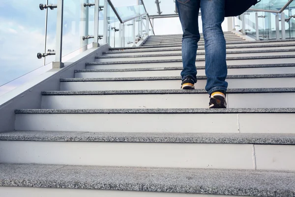 Man on office stairs