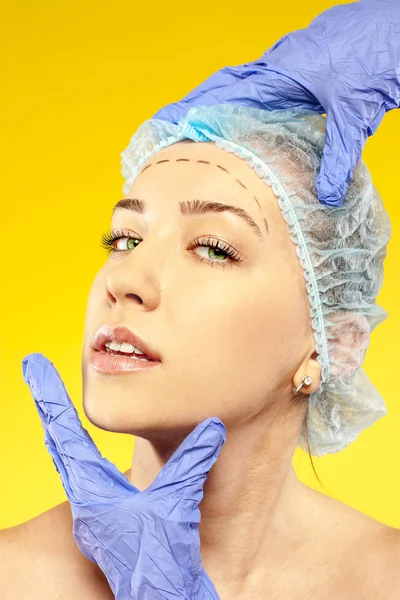 Plastic surgery. woman make inspection