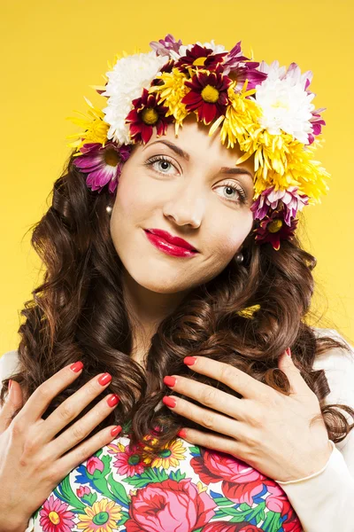 Attractive brunette with chic curly hair. studio