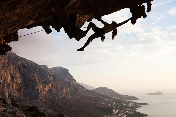 Rock climber at sunset, Kalymnos Island, Greece