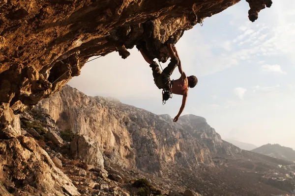 Rock climber at sunset, Kalymnos Island, Greece