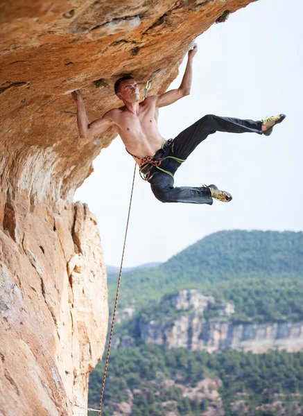 Rock climber on a cliff