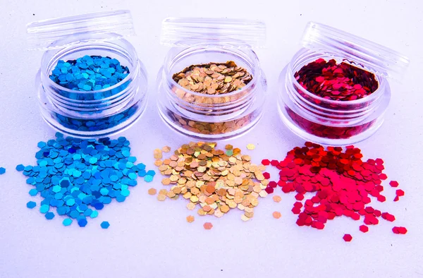 Picture of three different kinds of nail glitters