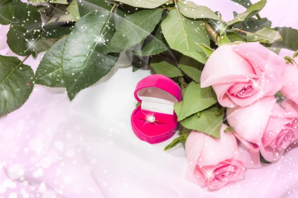 Pink roses with diamond ring