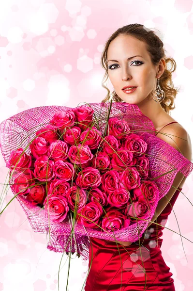 Woman with bouquet of pink roses