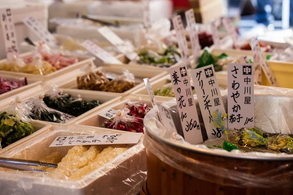 Exotic foods on display in traditional market in Japan.