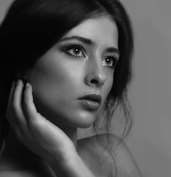 Beautiful thinking woman face looking. Closeup black and white portrait