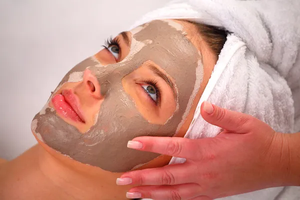 Spa clay mask on a woman's face