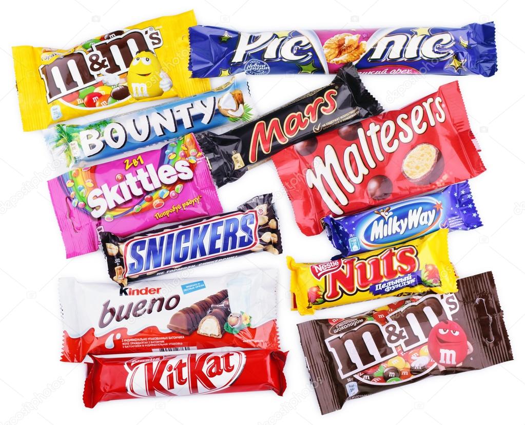 Closeup of various chocolate bars on white Stock Editorial Photo