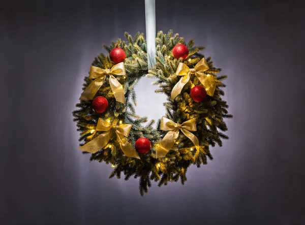 Advent wreath over silver grey background