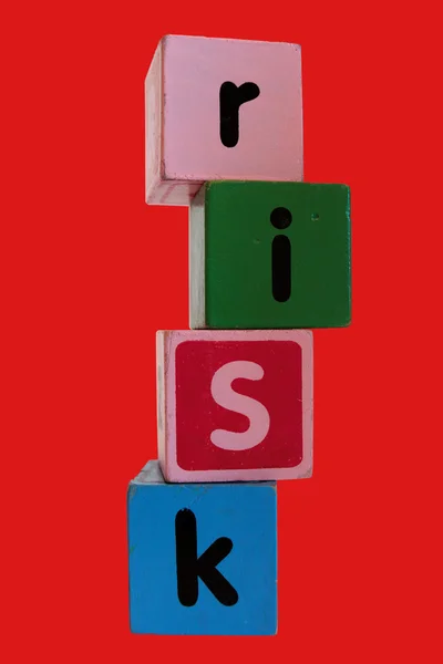 Risk in toy play block letters