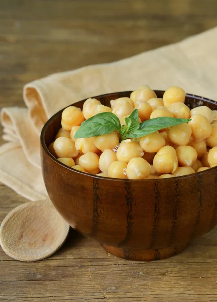 Fresh roasted chickpeas with basil leaves
