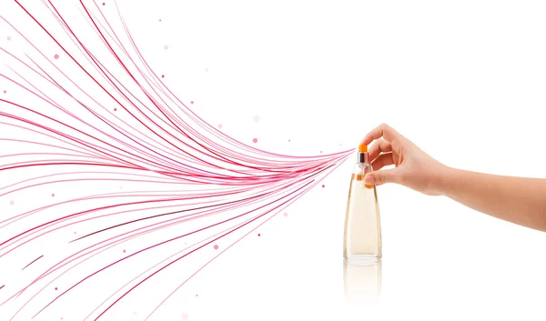 Woman hands spraying colorful lines