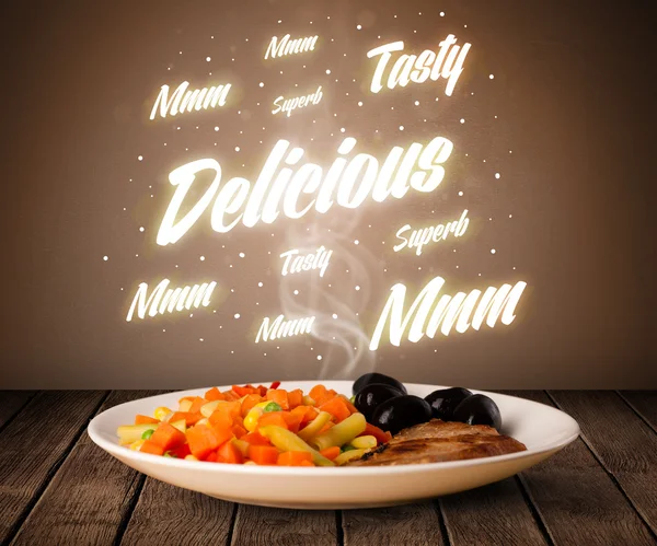 Food plate with delicious and tasty glowing writings