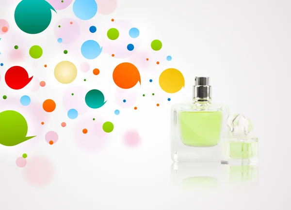 Perfume bottle spraying colored bubbles