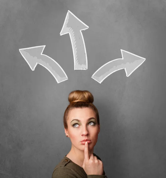 Young woman thinking with arrows above her head