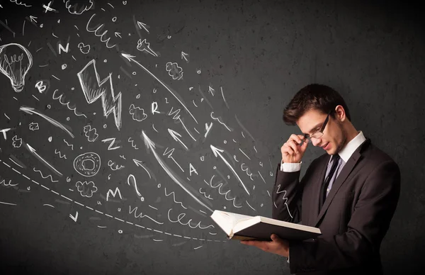 Young man reading a book