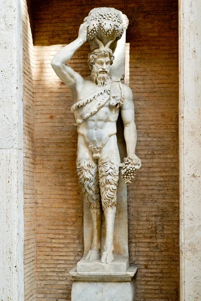 Statue of the Roman god of the Faun in Rome, Italy