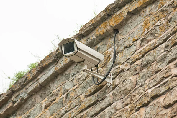 Video camera of system of supervision on a building wall