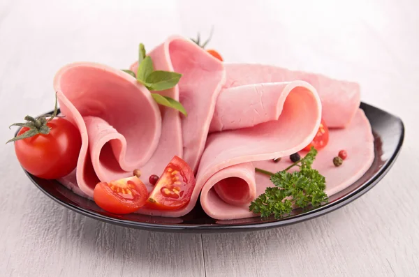 Sliced ham and tomato