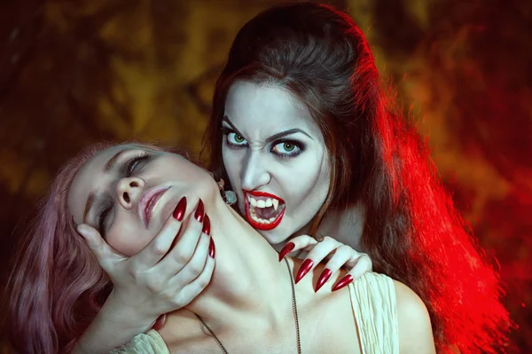 Beautiful vampire and her victim