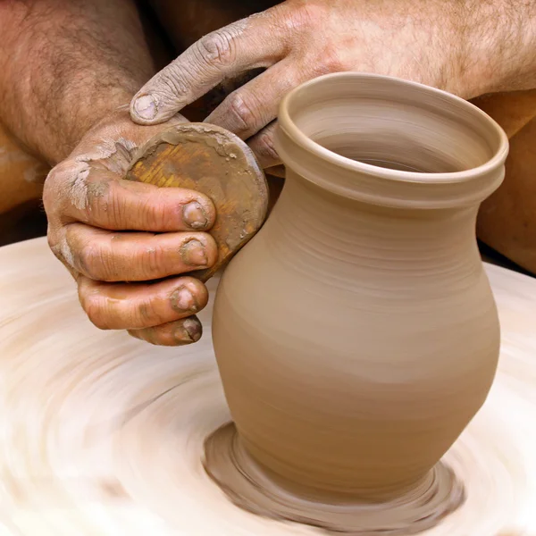Making clay pottery