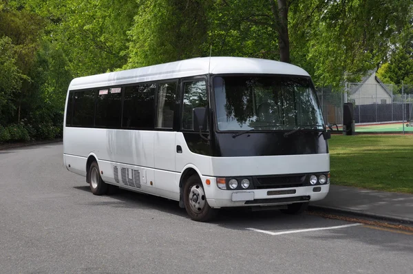 Small White Tour Coach Bus