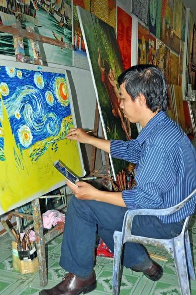 Artist Paints Van Gogh Reproduction in HCMC Art Market.