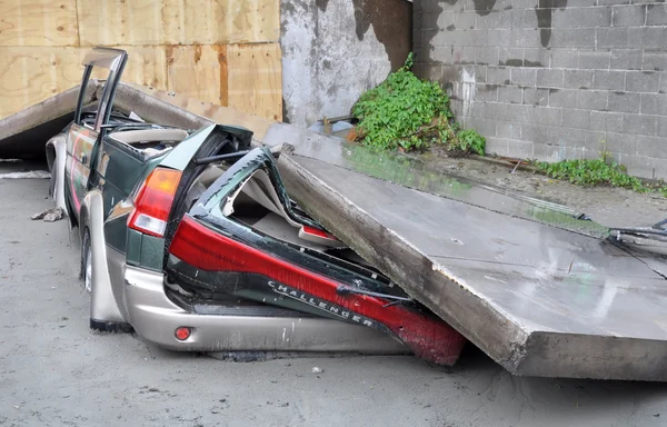 Christchurch Earthquake - Car Flattened by Collapsing Concrete.