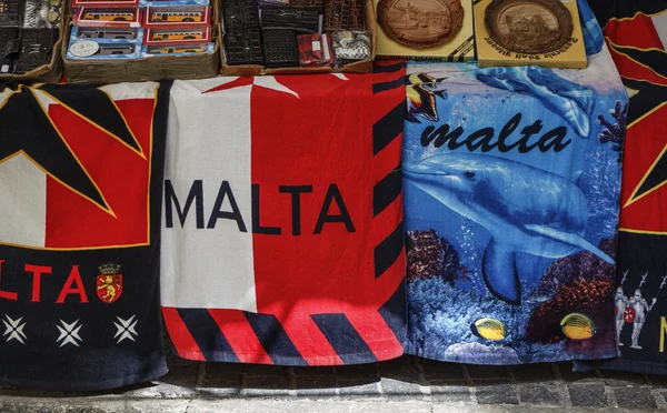 Maltese gadgets and beach towels for sale in a store