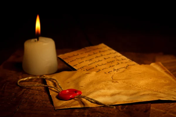 Vintage letter in envelope with wax seal