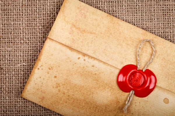 Old envelope with wax seal — Stock Photo #37204479