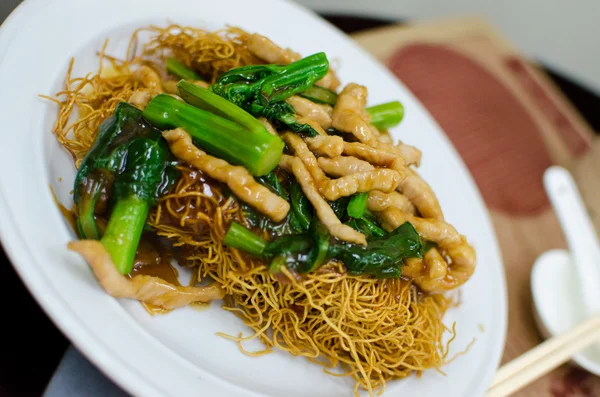 Asian style noodle with pork and vegetables