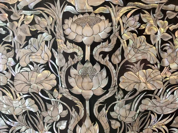Mosaics lotus with a pearl shell in a Thai temple.