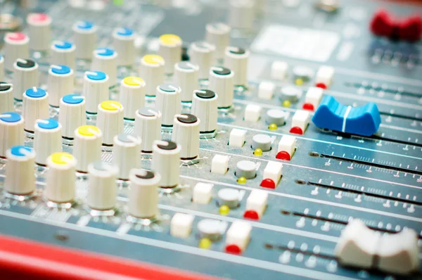 DJ turntable sound mixer in nightclub